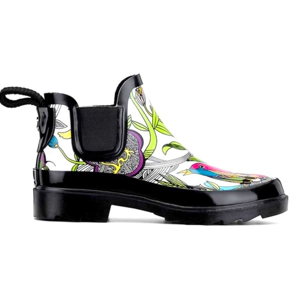 New and never worn Sak Roots rain boots -Optic white peace rhyme pattern